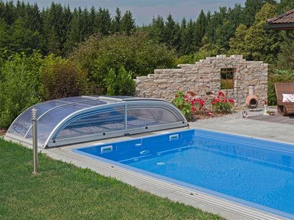 one piece swimming pool with star or star plus pool enclosure retracted
