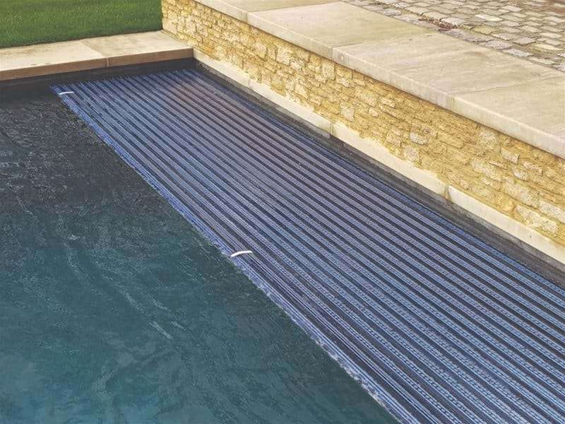 close up of automatic slatted pool cover