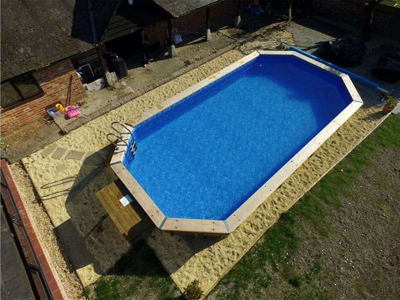 top down view of above ground wooden swimming pool.