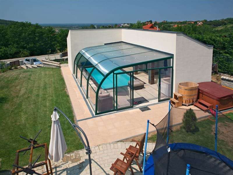 eagle view of endless summer pool enclosure covering a one piece swimming pool.