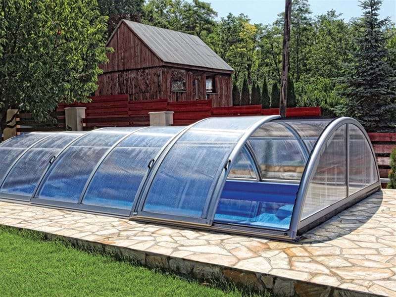 sun or sky pool enclosure with one section retracted.