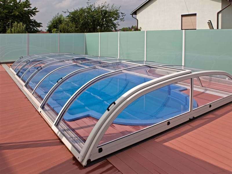 star or star plus pool enclosure covering a one piece swimming pool.