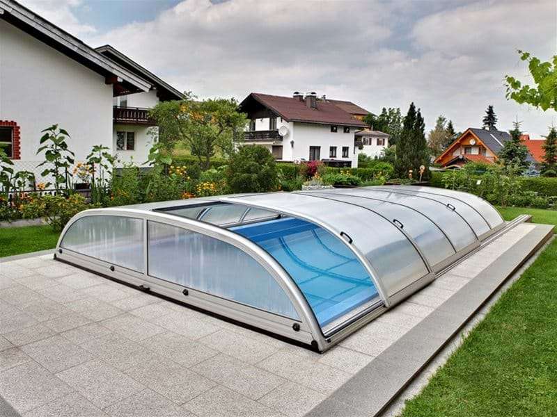 star or star plus pool enclosure covering a one piece swimming pool.