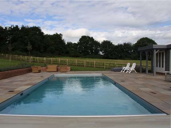 swimming pool with coverstar pool cover.