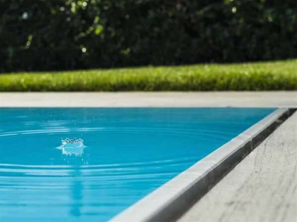 close up of overflow evolution one piece swimming pool.