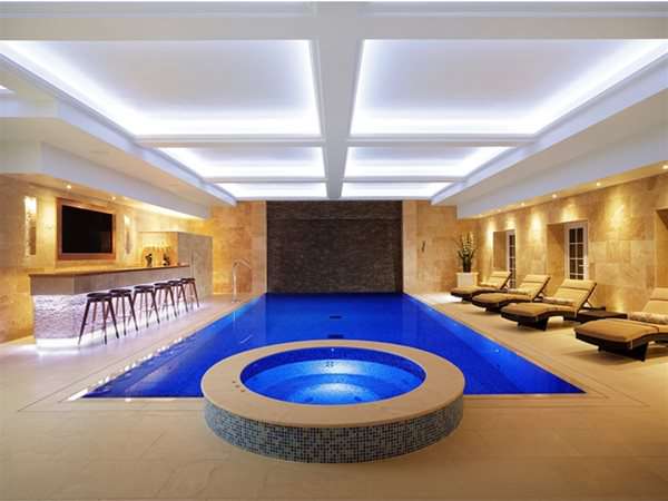 indoor pool with roldeck pool cover retracted.