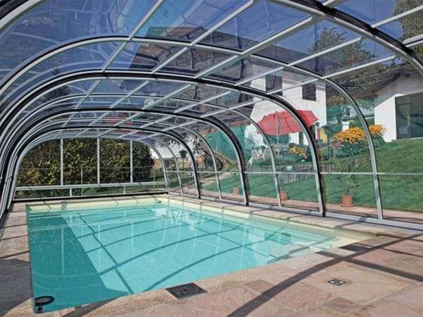 one piece swimming pool with harmonie pool enclosure.