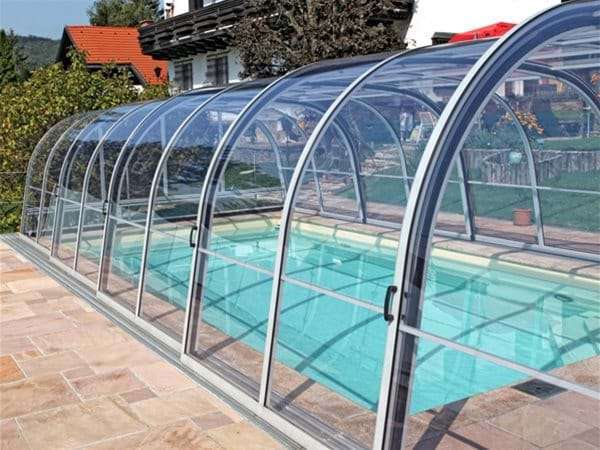 one piece swimming pool with harmonie pool enclosure.