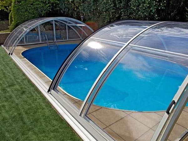 one piece swimming pool with AQBox pool enclosure open.